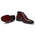 Burgundy boots from Posh Footwear, showcasing premium leather craftsmanship and stylish design.