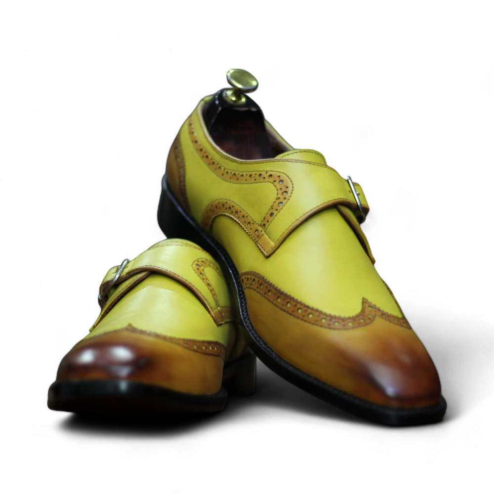 Two Tone Monk Shoes featuring a classic design with contrasting colors, showcasing high-quality leather and elegant buckles.